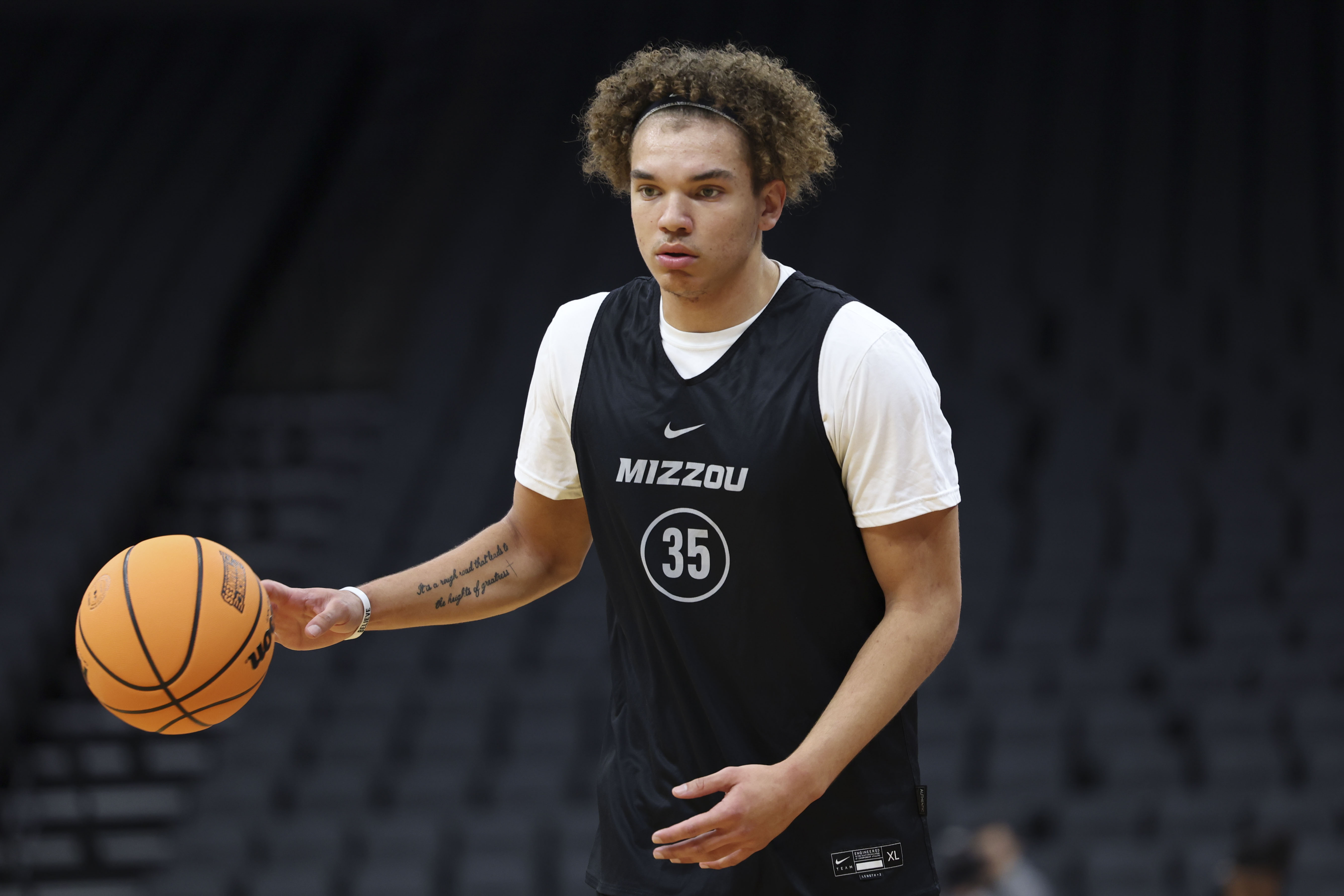 Mar 15, 2023; Sacramento, CA, USA; Missouri Tigers forward Noah Carter (35) dribbles during practice.